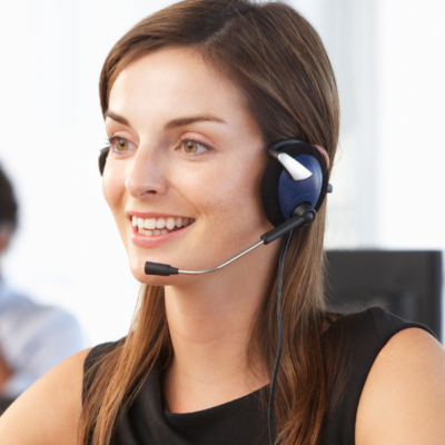 Woman with headset in call centre